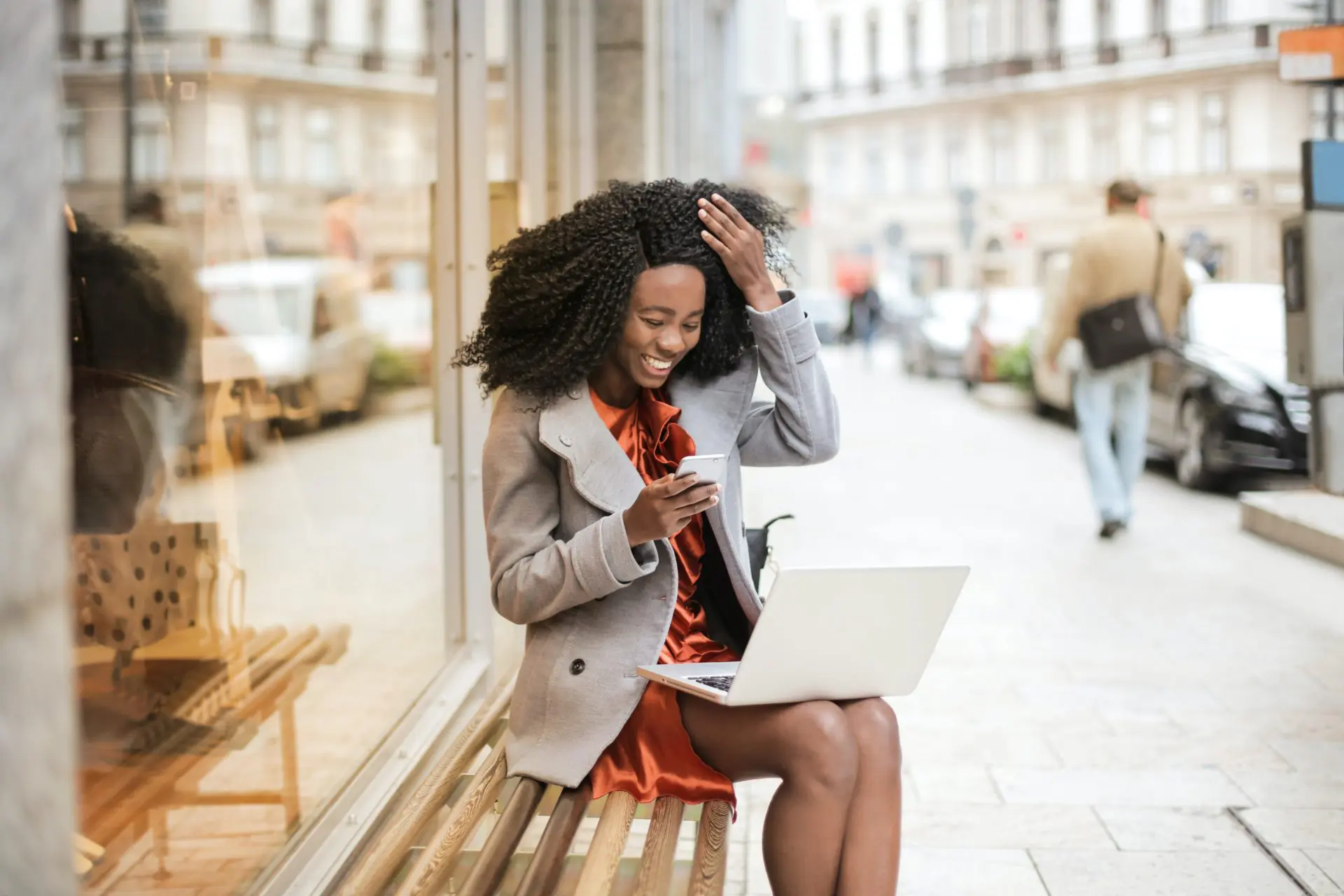 woman managing sales agreement on a laptop