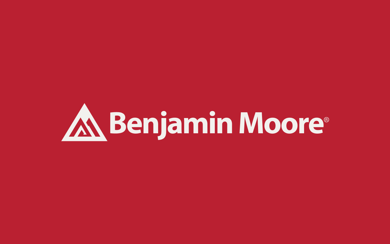 White Benjamin Moore logo with a stylized triangular icon on a solid red background. The bold white Benjamin Moore text appears to the right of the icon.